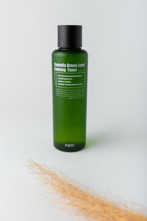 Izmail, Ukraine. March 2022. Purito Centella green level calming toner. Face skin care cosmetics moisturizer bottle on white backgroundのeditorial素材