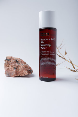 Izmail, Ukraine. March 2022. Wishtrend Mandelic acid Skin prep water bottle on white background. Korean cosmetics, exfoliator for dull skinのeditorial素材