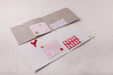 Izmail, Ukraine. 14 February 2022. Valentines day postcard with red heart, cake and ladybug illustration on white backgroundのeditorial素材