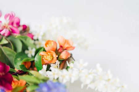 Bouquet of spring flowers on a white background. Copy space.