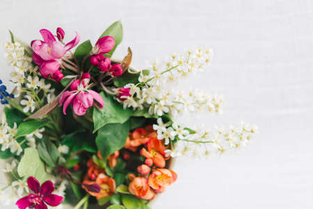 Bouquet of spring flowers on a white background. Flat lay, top view.の写真素材