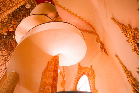 spiral staircase in a Buddhist temple in Bangkok, Thailand. The photo is taken on 25.12.19のeditorial素材