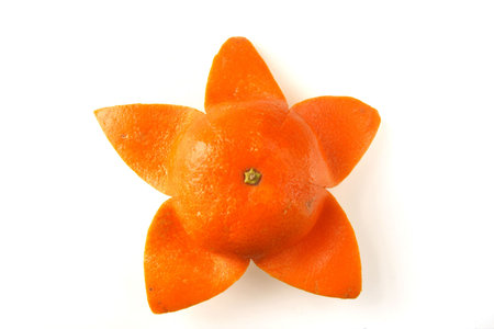 star shaped half peeled orangeの写真素材