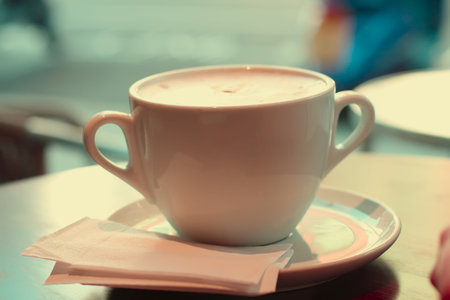 large cup of coffee in retro style colors, special retro style ligth effect. shallow DOFの写真素材