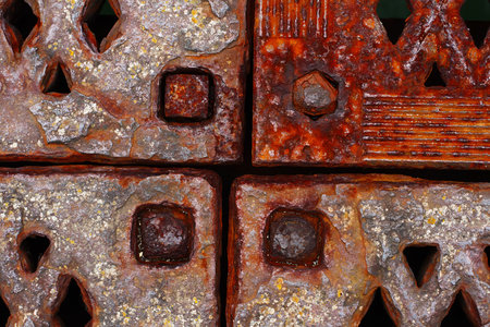 grunge rusty metal frames four corners with rivets, close-upの写真素材
