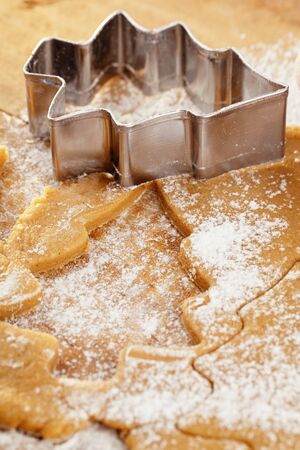 christmas gingerbread tree cookies with cutter , dough  full frameの写真素材