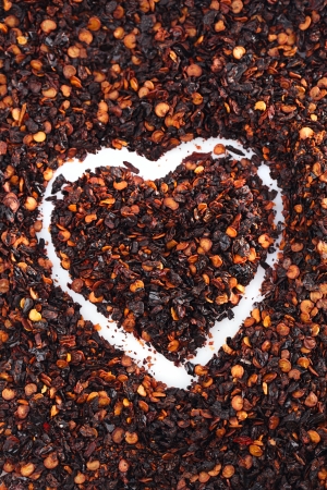 chipotle - jalapeno smoked chili flakes background, shallow dofの写真素材