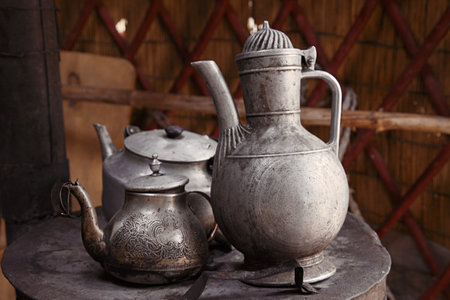 old teapot and kettle in a kyrgyz yurt kitchen, shallow dofの写真素材
