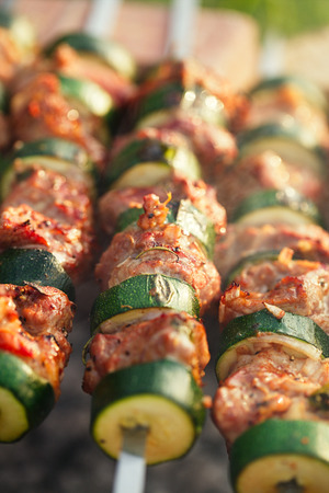 Shish kebab with vegs and mix of spices on bbqの写真素材