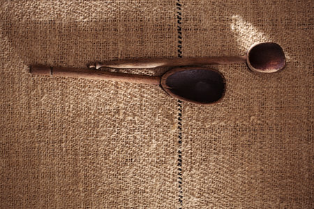 real vintage wooden spoons on old grain sacking linen Completely hand made  handwoven and homespunの写真素材