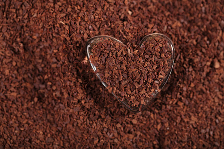 heart shaped glass with grated dark chocolate, perfect color and backgroundの写真素材