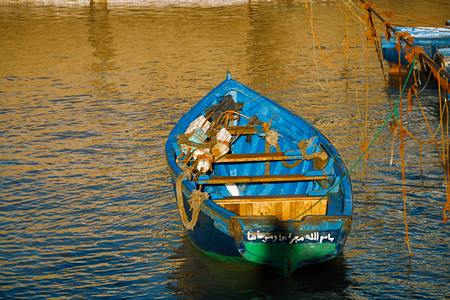 Boats docked in the Skala du Port in Essaouira, Morocco.の写真素材
