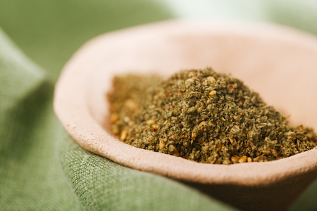 Zaatar spice mix - traditional Middle Eastern blend made with thyme, sesame seeds, salt, sumac, oregano, cumin, fennel seeds and marjoramの写真素材