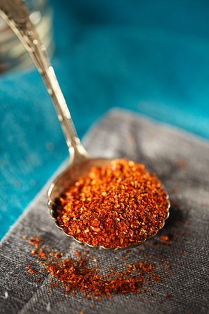 Natural ground sun dried tomatoes powder have a very particular flavour, both sweet and savouryの写真素材