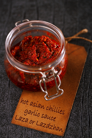 Extreme hot asian chillies garlic paste sauce - Laza or Lazdzhanの写真素材