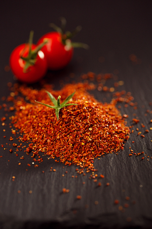 Natural ground sun dried tomato powder have a very particular flavour, both sweet and savouryの写真素材