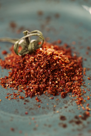 Natural ground sun dried tomatoes powder have a very particular flavour, both sweet and savouryの写真素材