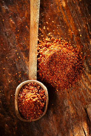 Natural ground sun dried tomatoes powder have a very particular flavour, both sweet and savouryの写真素材