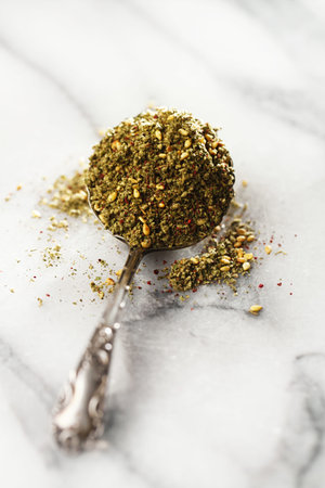 Zaatar spice mix - traditional Middle Eastern blend made with thyme, sesame seeds, salt, sumac,...