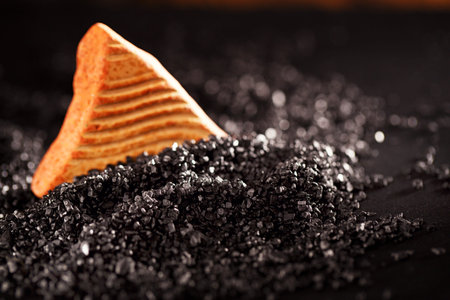 Hawaiian black lava sea salt has less sodium than regular sea saltand is richer in minerals and nutrients.の写真素材