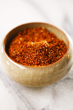 Natural ground sun dried tomatoes powder have a very particular flavour, both sweet and savouryの写真素材