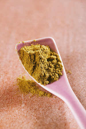 Jalapeno Green Chilli Powder on pink narble backgroundの写真素材