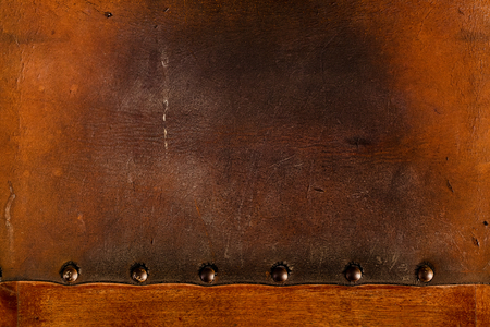 old weathered leather tacked full texture backgroundの写真素材