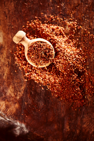 Natural ground sun dried tomatoes powder have a very particular flavour, both sweet and savouryの写真素材
