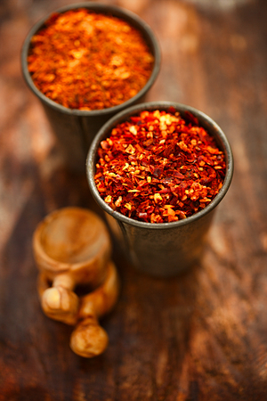 Harissa and Ras el hanout  spice mix  - a mixture of the best spices with morrocan red hot chillesの写真素材