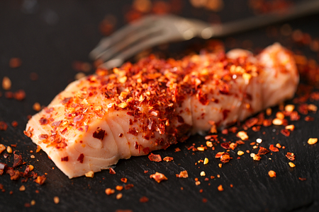 harissa spice mix - morrocan red hot chilles with king prawnsの写真素材