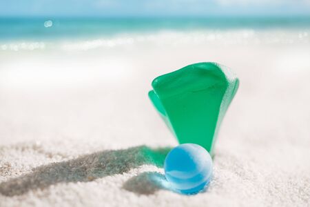 sea glass and marble  with white sand beach  seascapeの写真素材