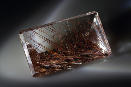 Quartz with rutile. Cut stone.の写真素材