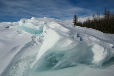 Blocks of ice under the snow. Moma Mountains. Yakutia. Russia.