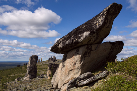 Detached granite rocks of unusual shape on the dais. Ridge Ulakhan-Sis. Yakutia. Russia.の写真素材