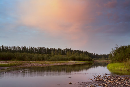 Red clouds over the river. The River Moma. Yakutia. Russia.の写真素材
