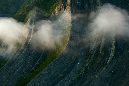 The mist along the rocky shores of the river. The Indigirka river, Sakha Republic, Russia.の写真素材