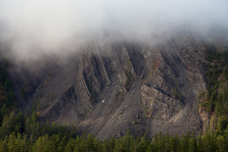 The mist along the rocky shores of the river. The Indigirka river, Sakha Republic, Russia.の写真素材