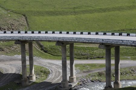 Bridge in the mountains of North Ossetia. The Caucasus. Russia.の写真素材