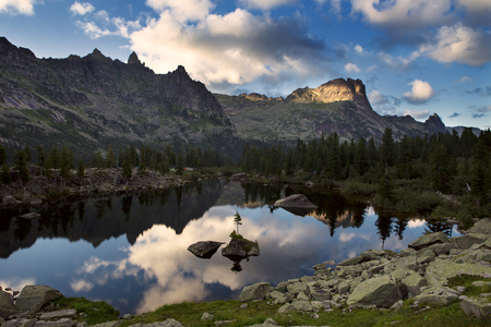 Mountain lake with island in the middle. Western Sayan. Natural Park Ergaki. Krasnoyarsk region. Russia.の写真素材