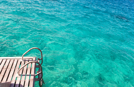 Ladder, steps  downwards, to oceanの写真素材