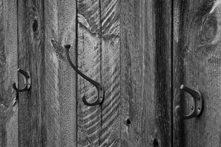 Pegs on a weathered wallの写真素材