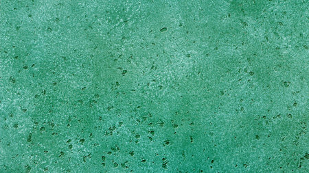 Green emerald stone background, wall or floor. Abstract texture for graphic design or wallpaper.の写真素材
