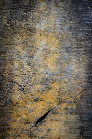 Old grunge stone wall texture and pattern background for halloween design and text
