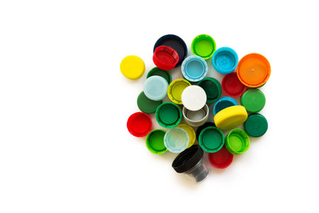 Various colorful plastic screw caps isolated on the white background. Conception of plastic...