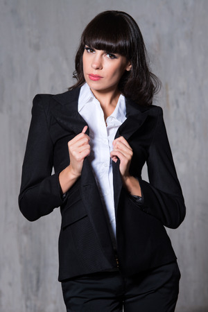 the woman in a jacket in studioの写真素材