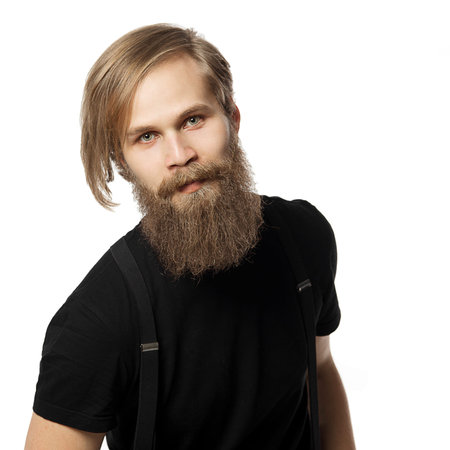 the attractive man the blonde with long hair of the European appearance with a beard in a black...
