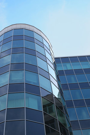 Facade of office building on a background lightblue skyの写真素材