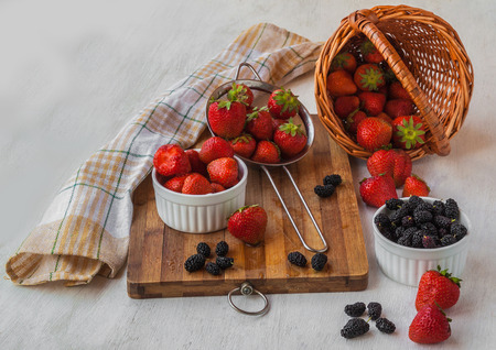 Fresh strawberries on a kitchen tableの写真素材
