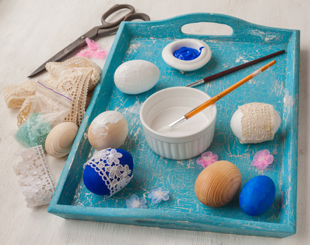 Coloring Easter eggs and decoration lace. Easter art and handicraftsの写真素材