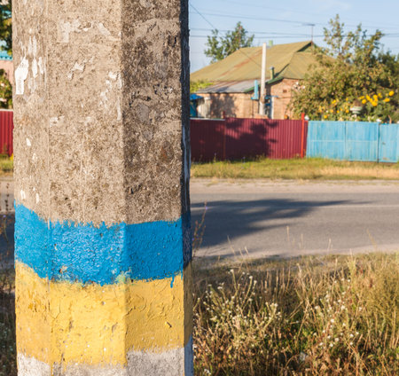 Flag on a pillar in the Ukrainian villageの写真素材